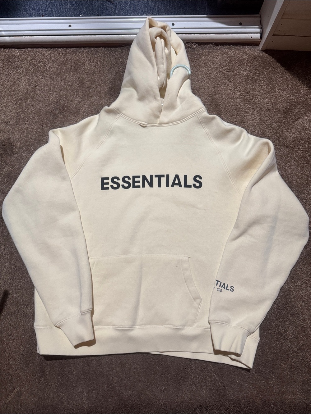 Essentials Cream Hoodie with Black Logo